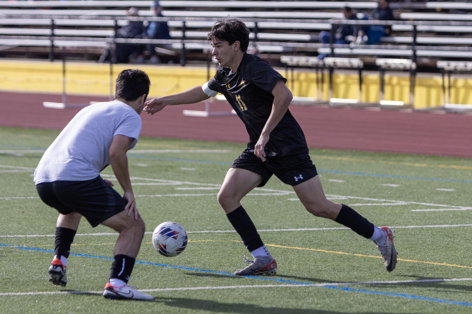 Photo Story: Boys soccer triumphs 3-2 in annual alumni game