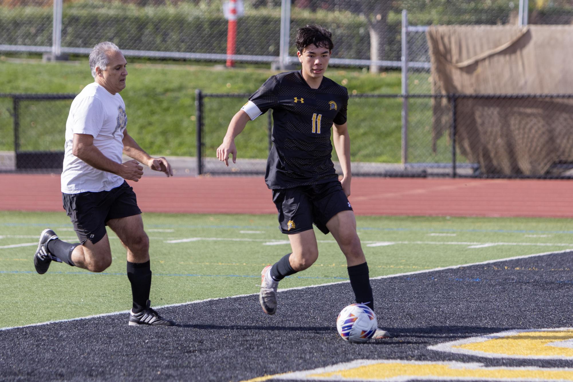 Photo Story: Boys soccer triumphs 3-2 in annual alumni game