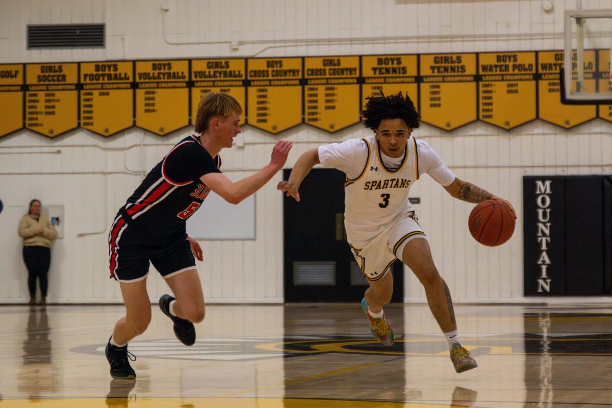 Photo Story: Boys basketball overpowers Gunn 71-47