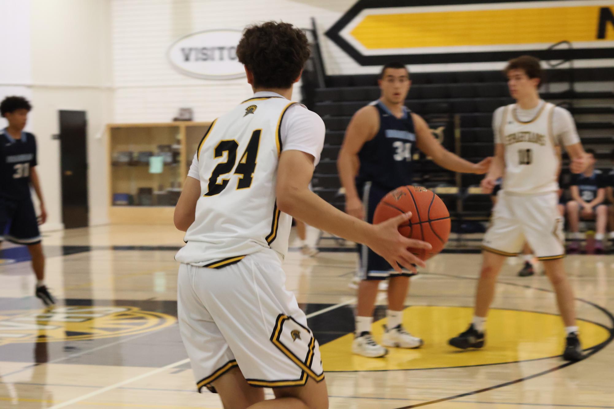 Boys basketball falls to Branham 65-69