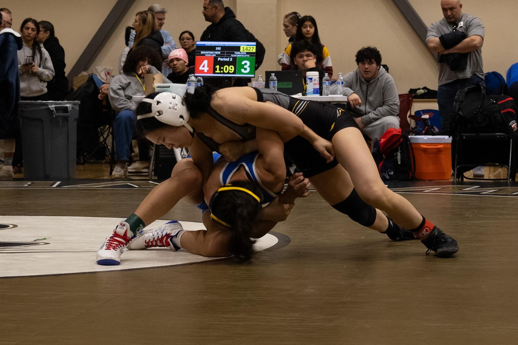 Senior captain Liberty Evans joined the ranks of MVHS wrestlers who have made it to the CIF State Tournament in Bakersville on Feb. 26, which marked the first time MVHS sent two wrestlers to the tournament. Her teammate, junior captain Kiana Lien placed 3rd at the tournament, which made her the first ever CIF state placer, and three-time CIF state qualifier.
This ended a historic season for the girls wrestling team, they placed 1st in SCVAL, 2nd in CCS Northern, and had 4 wrestlers place at CCS Masters; Evans 2nd (155), Lien 3rd (100), sophomore Emeline Zuber 5th (235), and junior Raven Rasmussen-Dailey 6th (135).